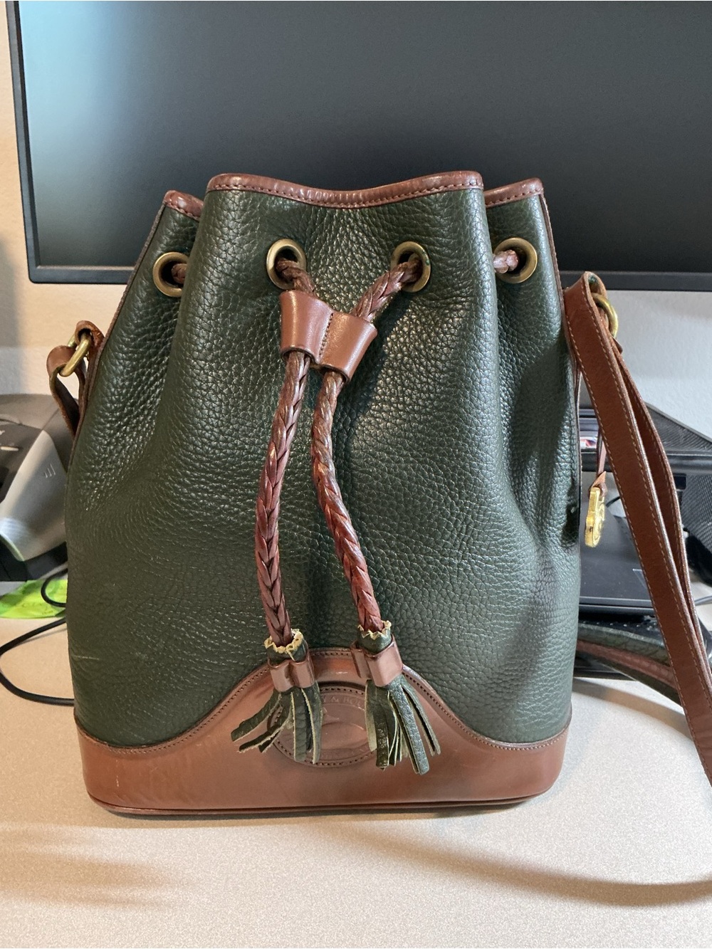 Dooney & Bourke Green Pebbled Leather Bucket Bag with Dark Brown Trim
